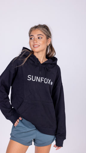 girl wearing black sunfox hoodie